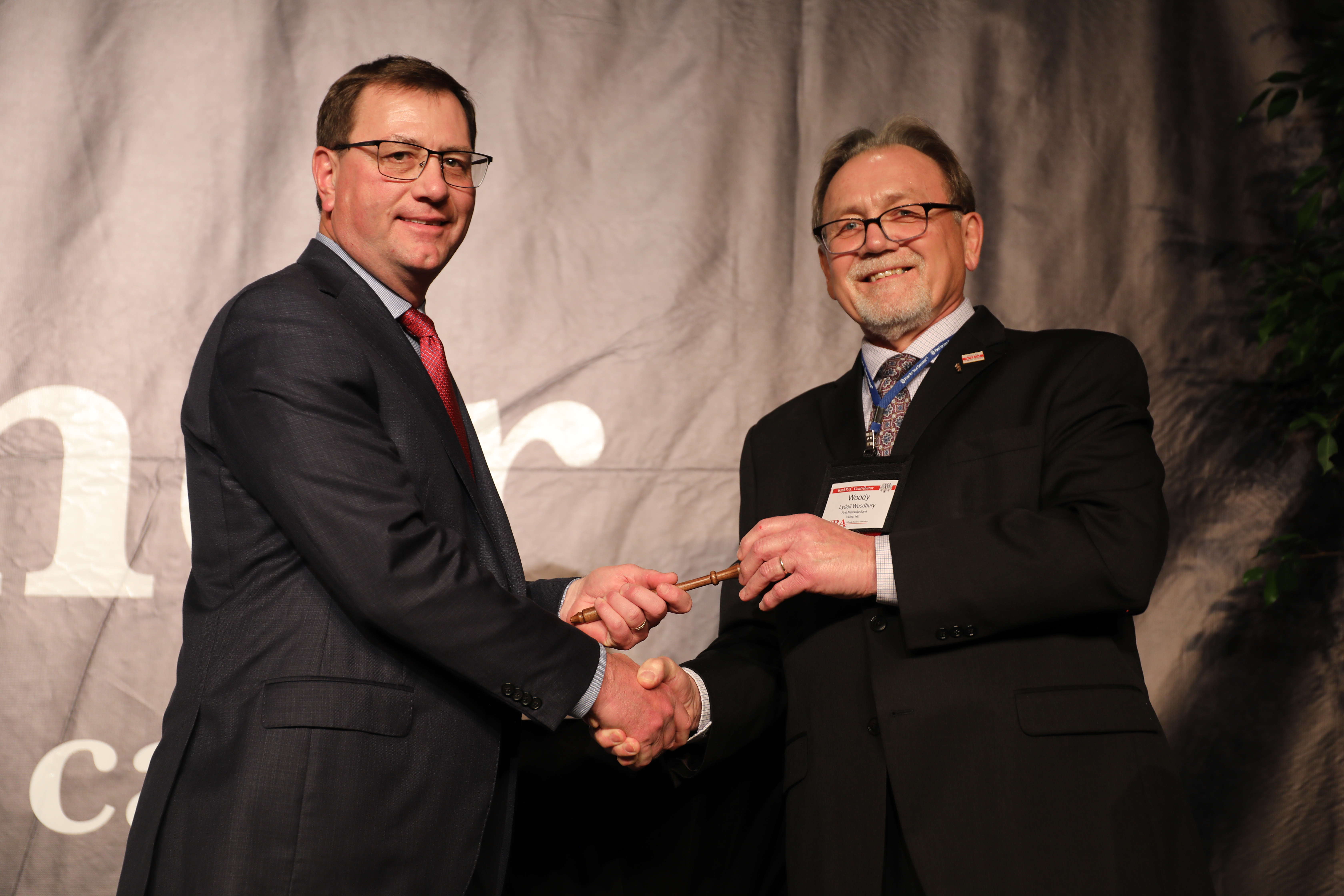 Woody passed the gavel after serving as chairman of the Nebraska Banker's Association for 12 months.